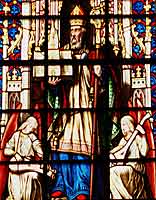 Saint Gilles patron de la ville d'Edimbourg sur un vitrail du Scott Monument